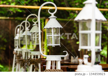 Beautiful white lanterns lined up in a row Beautiful white lanterns lined up in a row 134859923