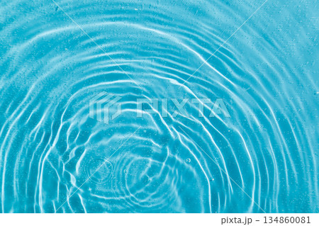 drops on water with circles on a blue background drops on water with circles on a blue background 134860081
