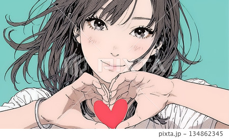 ハートマークを手で作り愛情表現をしている若い女性