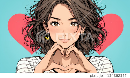 ハートマークを手で作り愛情表現をしている若い女性