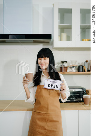 Startup successful small business owner sme woman stand with tablet  in cafe restaurant. 134865706