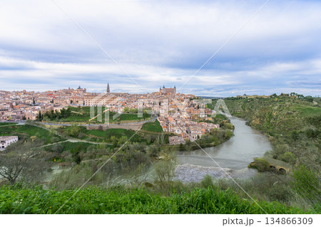 Historic Toledo cityscape at spring dusk with Tagus River, Spain. Historic Toledo cityscape at spring dusk with Tagus River, Spain. 134866309