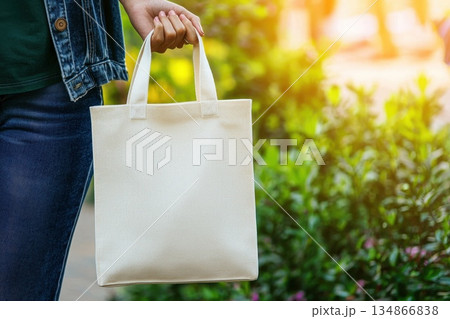Photorealistic Image of Unbranded White Tote Bag in Outdoor Setting Photorealistic Image of Unbranded White Tote Bag in Outdoor Setting 134866838