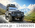 Bold Off-Road Vehicle Ready for Adventure with Packed Gear on Scenic Mountain Path 134866905