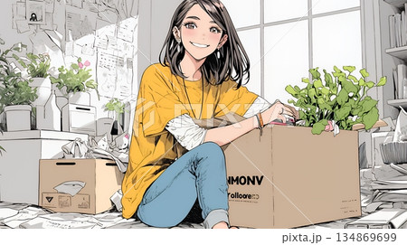 引っ越しの荷造り・荷解きをしている若い女性