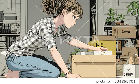 引っ越しの荷造り・荷解きをしている若い女性
