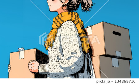 引っ越しの荷造り・荷解きをしている若い女性