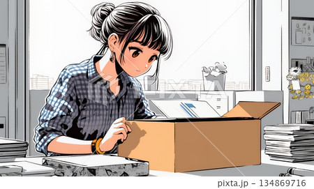 引っ越しの荷造り・荷解きをしている若い女性