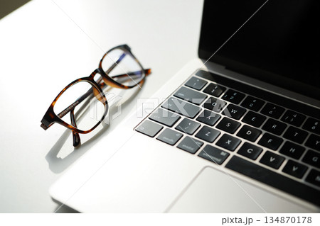 glasses on laptop 134870178