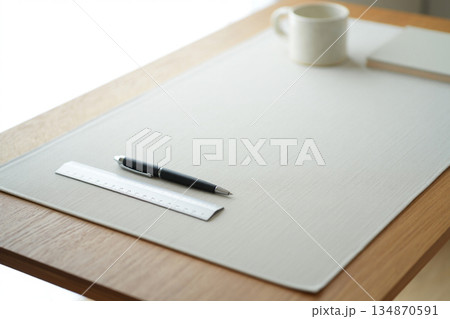 notebook and pen on table 134870591