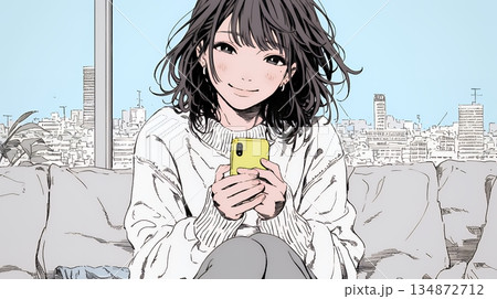 楽しそうにスマホ画面を眺めている若い女性