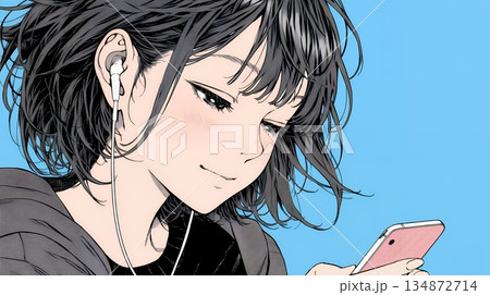 楽しそうにスマホ画面を眺めている若い女性