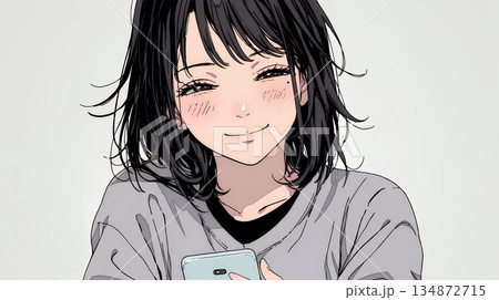 楽しそうにスマホ画面を眺めている若い女性