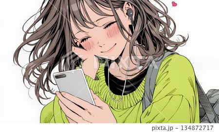 楽しそうにスマホ画面を眺めている若い女性