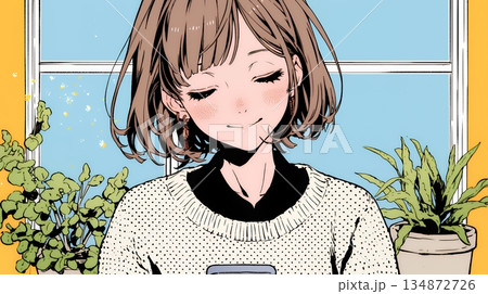 楽しそうにスマホ画面を眺めている若い女性