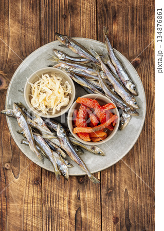 Assorted Dried Fish Snacks on a Plate Assorted Dried Fish Snacks on a Plate 134876861