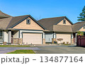 Row of nice residential houses on bright winter day in British Columbia, Canada 134877164