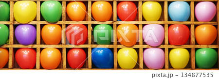 Balloon shooting gallery. Bright balls standing in a row Balloon shooting gallery. Bright balls standing in a row 134877535