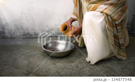 Man pour water into bowl Man pour water into bowl 134877548