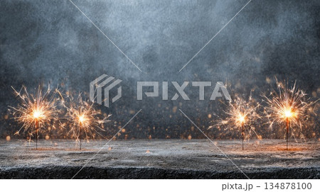 Minimal Festive Sparklers on Dark Textured Background with Copy Space 134878100