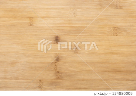 Close up photo texture of a bamboo cutting board, natural wood texture 134880009