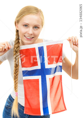 Young woman with norwegian flag 134882065