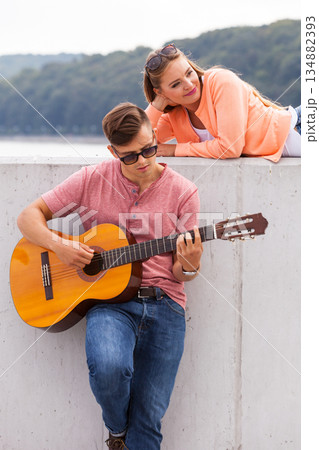 Charmed girl enjoying music. Charmed girl enjoying music. 134882393