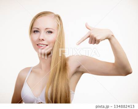 Girl wearing white bra 134882413