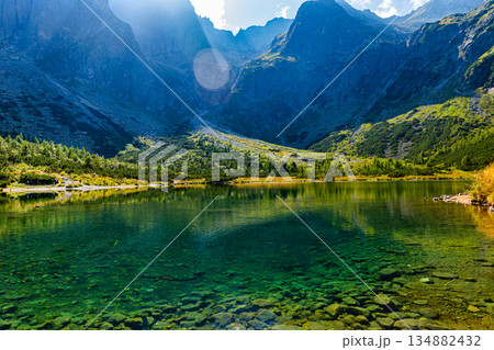 Deep emerald waters of Zelene pleso lake in High Tatras, Slovakia Deep emerald waters of Zelene pleso lake in High Tatras, Slovakia 134882432
