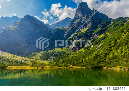 Majestic Jastrabia veza peak above Green Lake in High Tatras Majestic Jastrabia veza peak above Green Lake in High Tatras 134882433