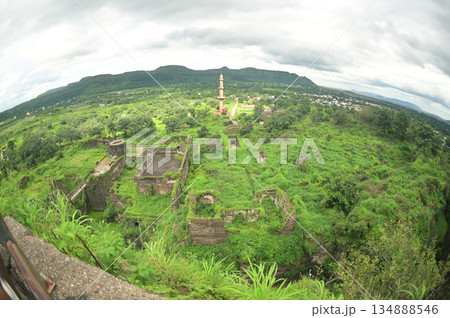 Top view of Daulatabad fort and Chand Minar (Tower of the Moon) , Built with massive stone walls showcasing medieval military architecture and cultural heritageIt. 134888546