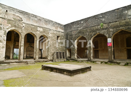 Classic arched entrance at Daulatabad Fort is an ancient fort located in Maharashtra, India. Originally named Deogiri, it is a fort built from natural rocks and is very strong. Classic arched entrance at Daulatabad Fort is an ancient fort located in Maharashtra, India. Originally named Deogiri, it is a fort built from natural rocks and is very strong. 134888696