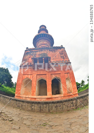 Chand Minar (Tower of the Moon) in Daulatabad fort entrance in maharashtra india.  Built with massive stone walls showcasing medieval military architecture and cultural heritageIt is now an important. 134888765