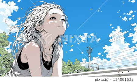 ぼんやり空を見上げている若い女性