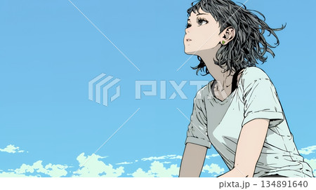 ぼんやり空を見上げている若い女性