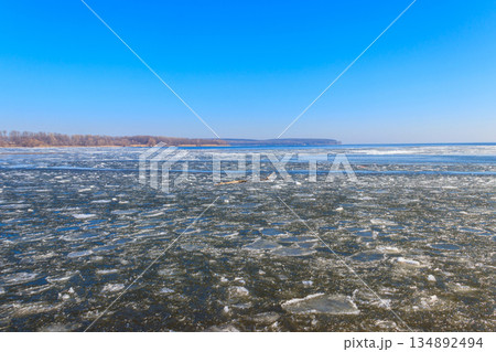 View of a lake with melting ice at spring 134892494