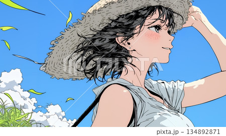 春風に飛ばされそうな帽子を、手で押さえる若い女性