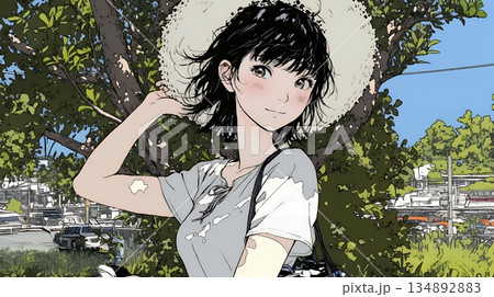 春風に飛ばされそうな帽子を、手で押さえる若い女性