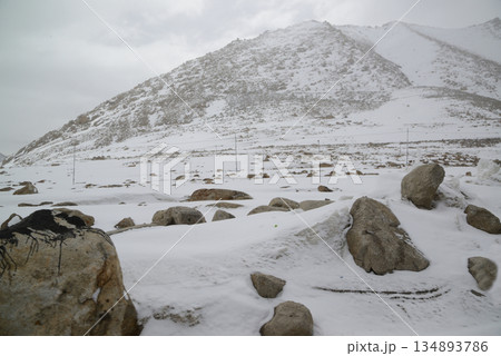 Changla Pass, one of the highest motorable roads in the world, at 5,275 meters above sea level, travels between Leh Ladakh and Pangong Lake. Located at Leh in India. 134893786