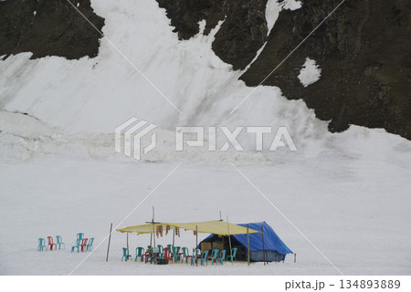 Villagers' tents are provided for tourists to use while skiing at Zero Point is a viewpoint located in Sonamarg, Kashmir, India , it is known for its beautiful scenery of vast grasslands and snow-capp Villagers' tents are provided for tourists to use while skiing at Zero Point is a viewpoint located in Sonamarg, Kashmir, India , it is known for its beautiful scenery of vast grasslands and snow-capp 134893889