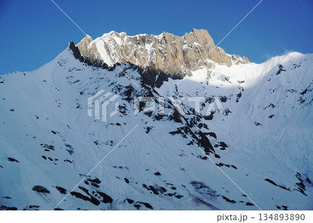 Beautiful sunlit mountain peak at Zero Point is a viewpoint located in Sonamarg, Kashmir, India. Located at an altitude of 4,200 meters above sea level, it is known for its beautiful scenery . Beautiful sunlit mountain peak at Zero Point is a viewpoint located in Sonamarg, Kashmir, India. Located at an altitude of 4,200 meters above sea level, it is known for its beautiful scenery . 134893890