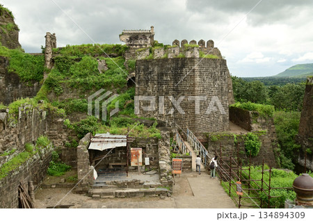Tourists visit in Daulatabad fort , Built with massive stone walls showcasing medieval military architecture and cultural heritageIt. 134894309
