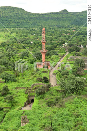 Chand Minar (Tower of the Moon) in Daulatabad fort entrance in maharashtra india.  Built with massive stone walls showcasing medieval military architecture and cultural heritageIt is now an important. 134894310