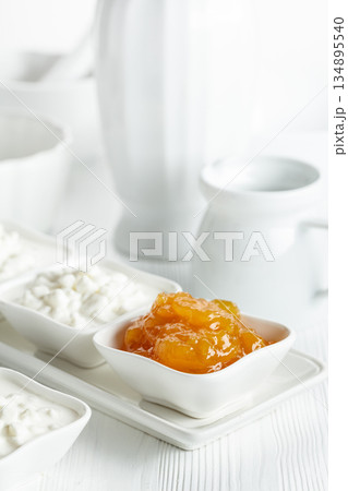 Mango jam and cottage cheese with cream. Mango jam and cottage cheese with cream. 134895540