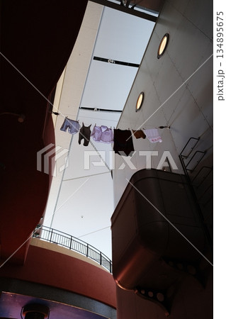 Industrial Interior with Hanging Leather Goods 134895675