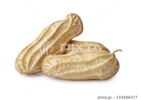 A pile of boiled peanuts in their shells isolated on a white background A pile of boiled peanuts in their shells isolated on a white background 134896477