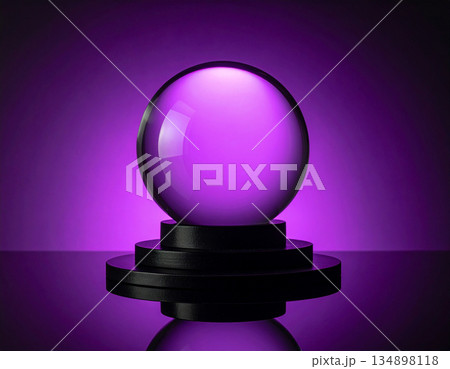 A glowing crystal ball is held steady on a black circular base reflecting soft purple ambient light. A glowing crystal ball is held steady on a black circular base reflecting soft purple ambient light. 134898118
