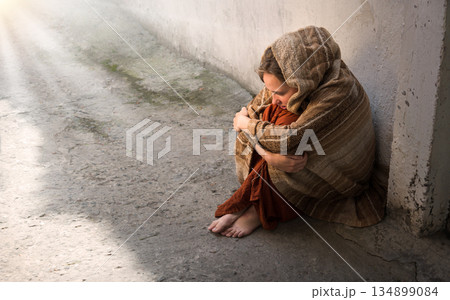 Frozen girl sitting on the floor Frozen girl sitting on the floor 134899084