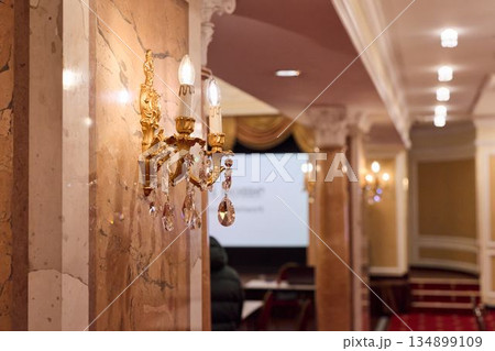 Luxurious Foyer With Lighting, Mezzanine Style Lobby With Marble Pillars And Projection Setup Luxurious Foyer With Lighting, Mezzanine Style Lobby With Marble Pillars And Projection Setup 134899109
