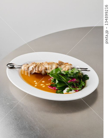 Nourishing skewer complemented by citrus and sesame seeds Nourishing skewer complemented by citrus and sesame seeds 134899216